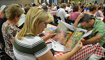 Ag in the Classroom event_participants looking at ag books